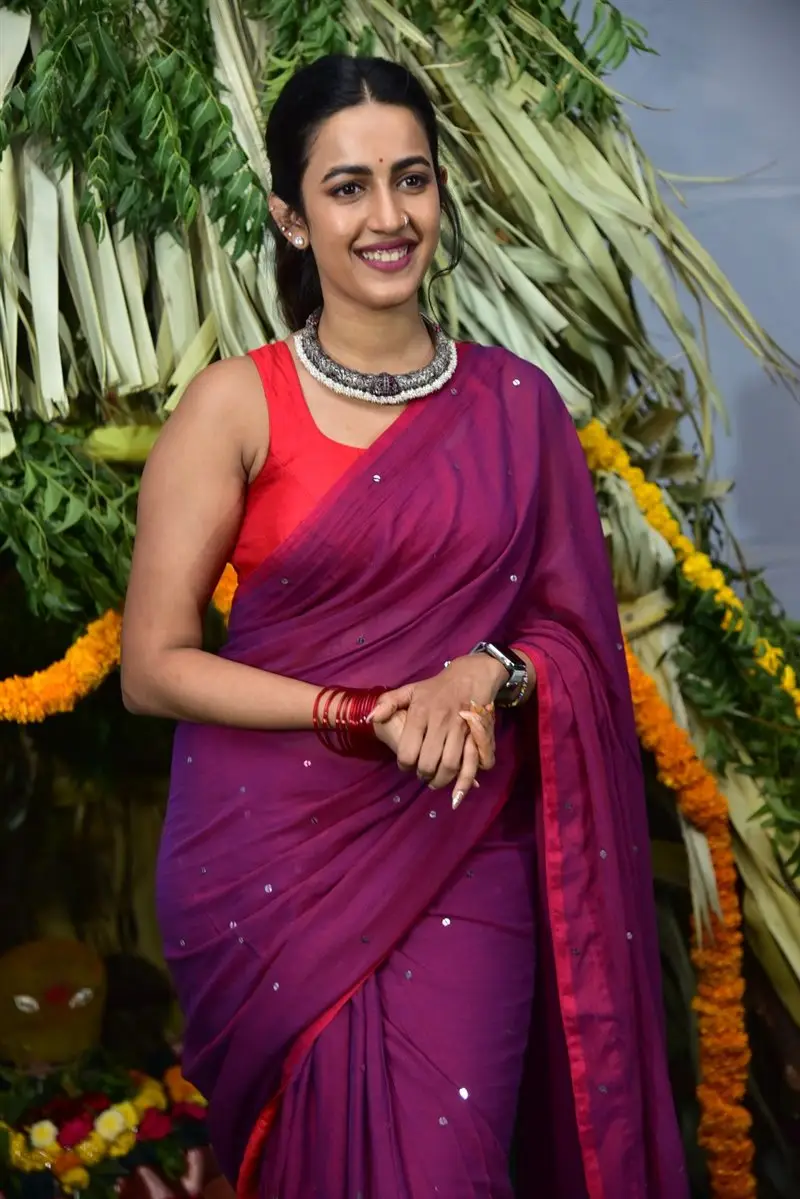 Niharika Konidela Stills in Violet Saree Sleeveless Orange Blouse